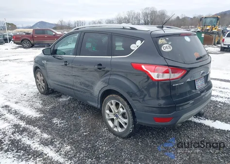 2015 Ford Escape Titanium z USA, uszkodzony, nr VIN 1FMCU9J91FUC20067